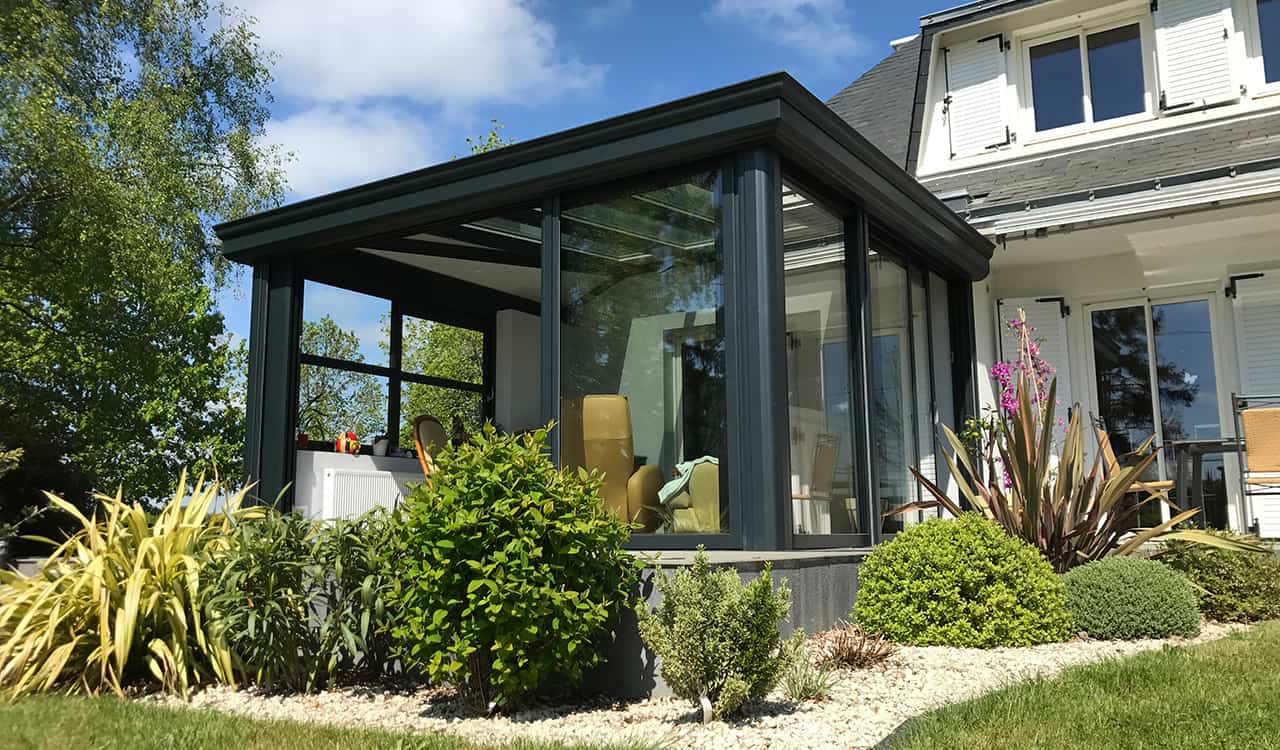 Véranda salon sur le jardin au Cellier (44) Rénoval Véranda