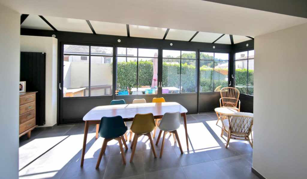 Véranda design salle à manger Rénoval